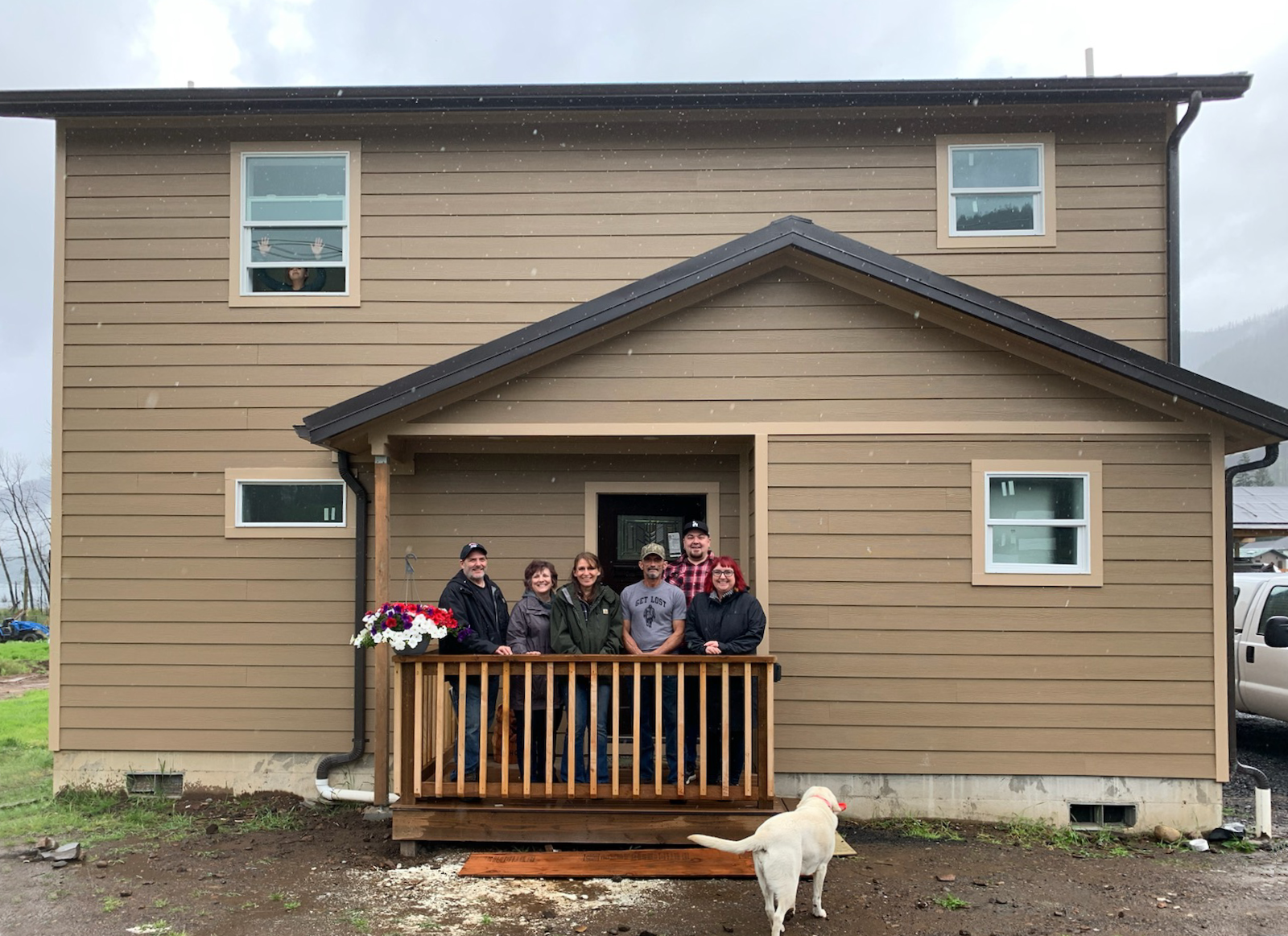 Warden family home and NW Rebuild Project team
