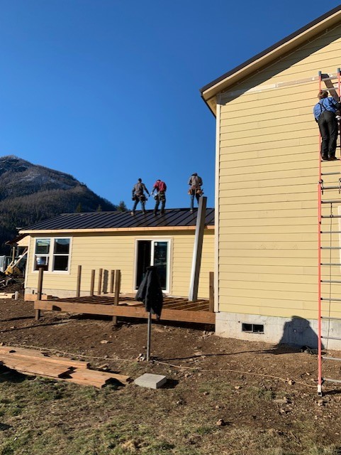 Metal roof and rough deck — Warden home